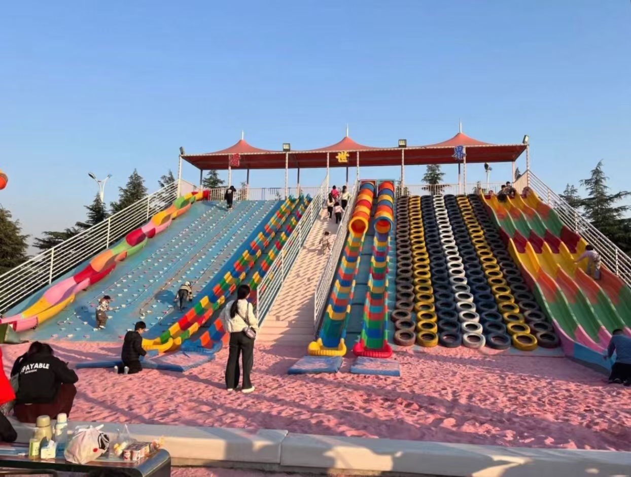 彩虹组合滑梯-专业户外无动力乐园厂家